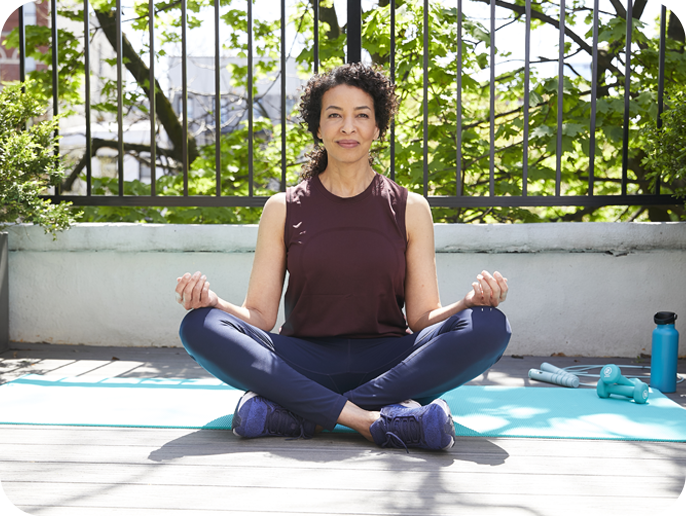 Woman doing yoga outside 