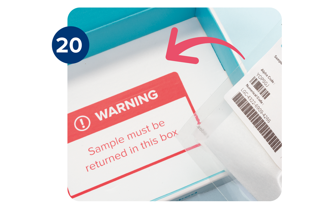 Biohazard bag being placed into the kit box. Biohazard bag being placed into the kit box.