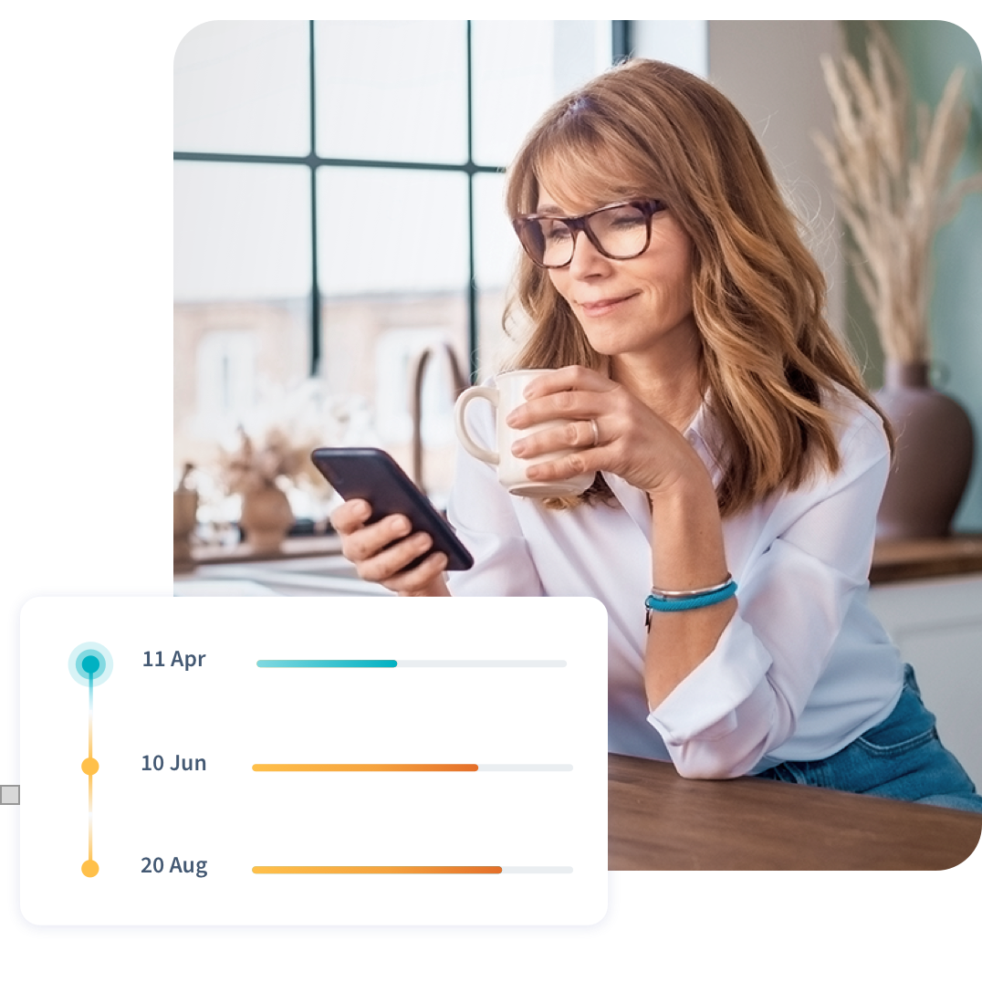 Woman reading test results on phone Woman reading test results on phone