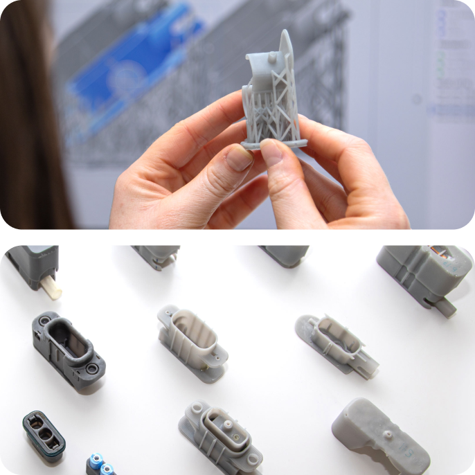 Collage showing hands holding 3D-printed components, and several different3D-printed components laying on a flat surface. Collage showing hands holding 3D-printed components, and several different3D-printed components laying on a flat surface.