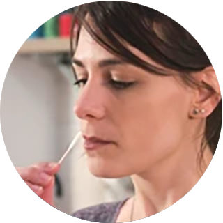 Woman collecting nasal sample 