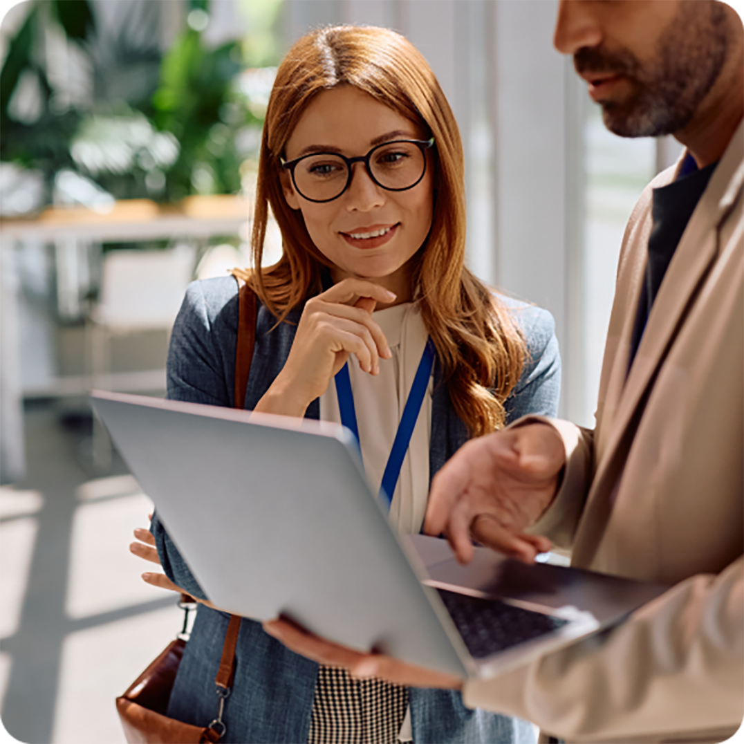 Coworkers collaborating in a bright office setting. Coworkers collaborating in a bright office setting.
