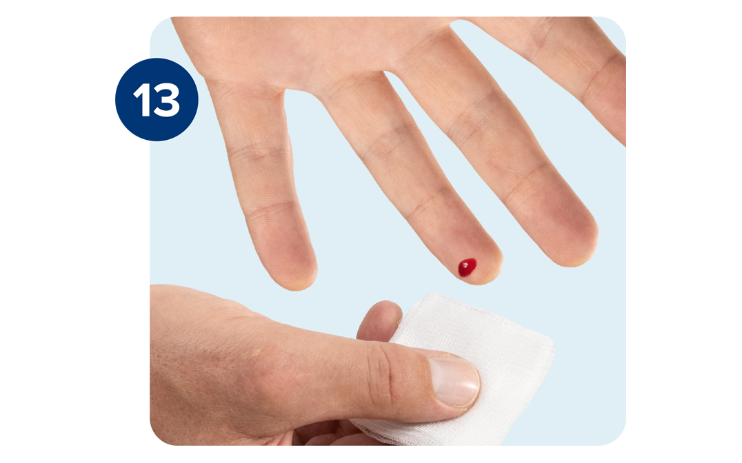 Right hand wiping away first small blood drop with gauze. Right hand wiping away first small blood drop with gauze.