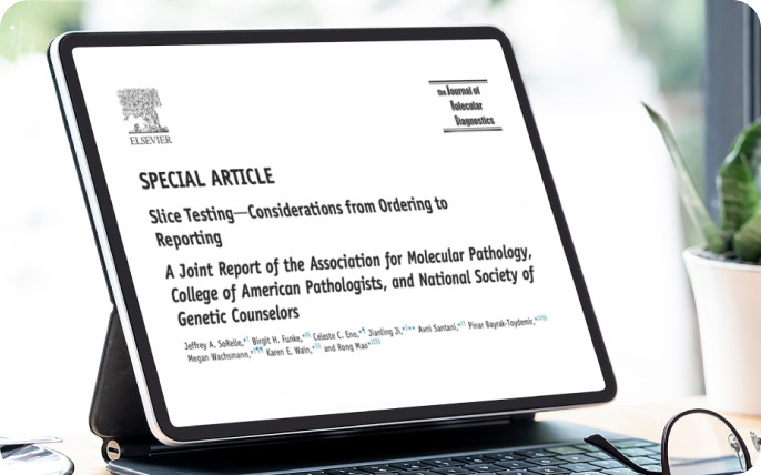 Tablet on a desk displaying a research article. Tablet on a desk displaying a research article.