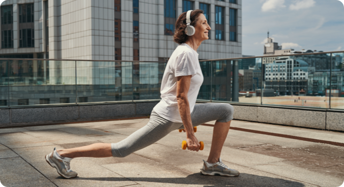 Woman working out on rooftop