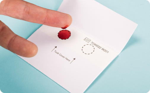 Close up of a dry blood sample collection method.