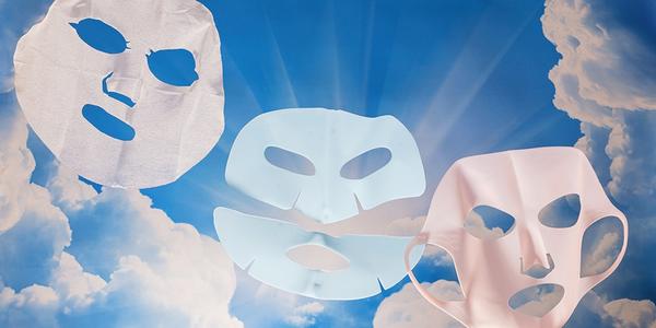 Three sheet masks with a blue sky background
