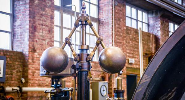Metal governor balls on a steam engine