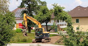 grävskopa på tomt
