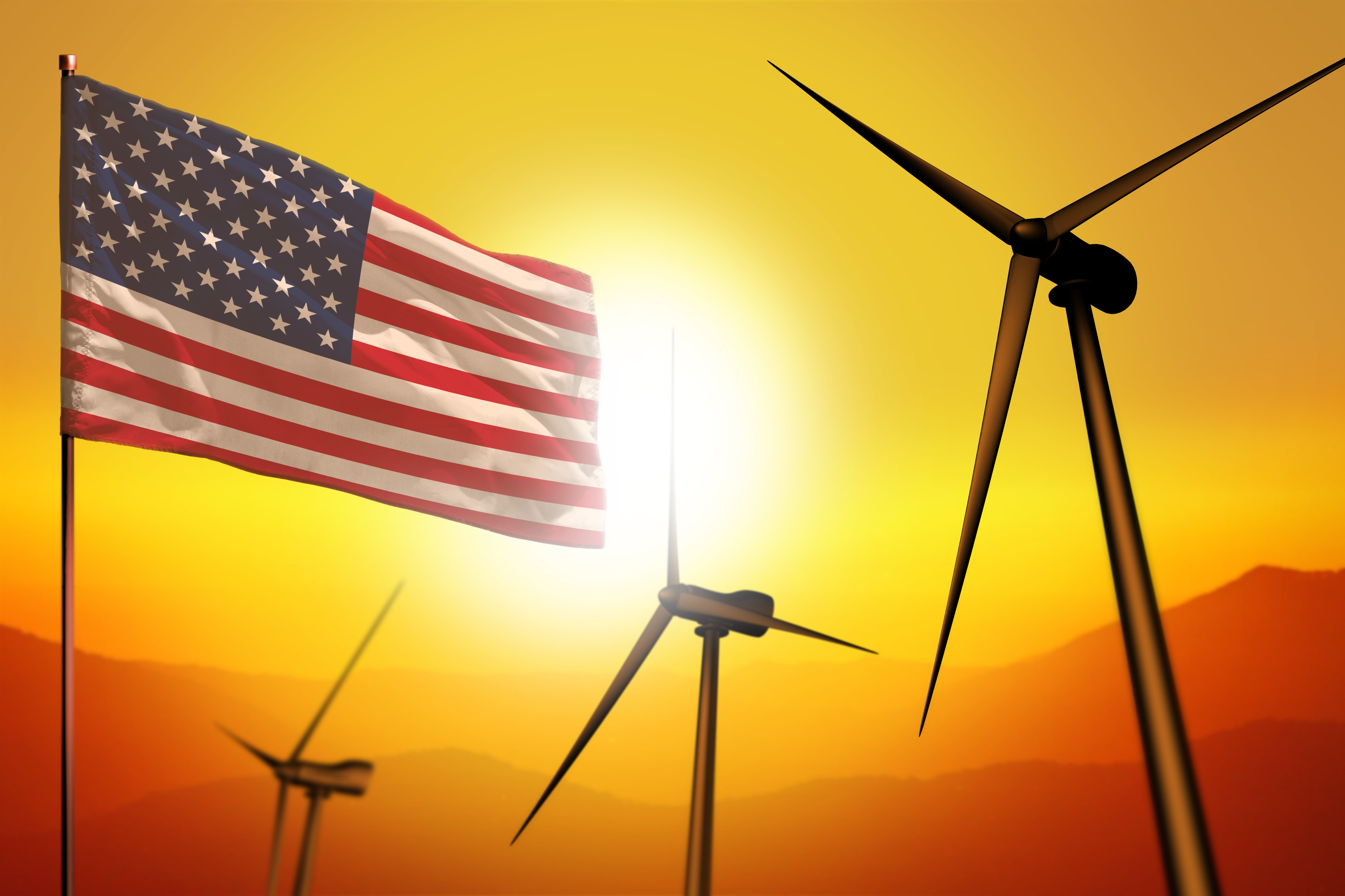 a flag and wind turbines