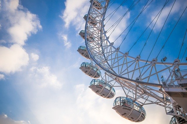 a ferris wheel with people on it