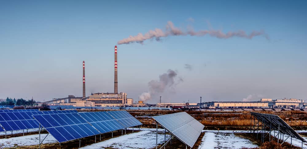 a factory with smoke coming out of it