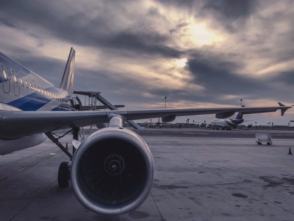 a large airplane is parked on the runway