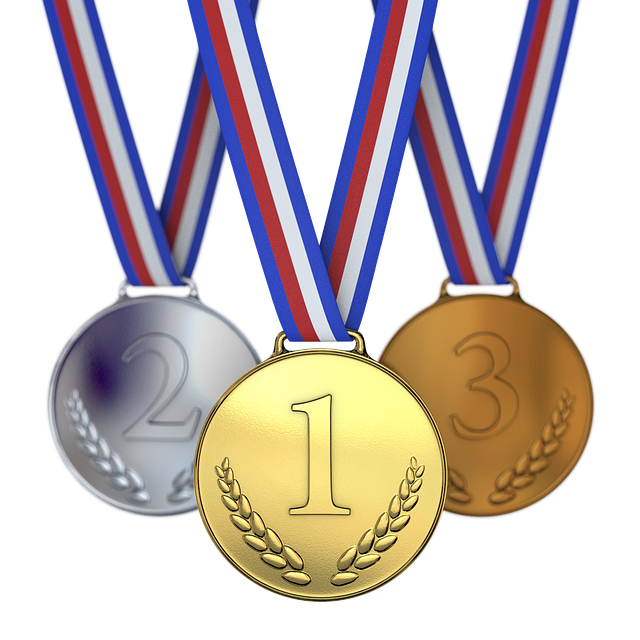 gold medals with red and blue ribbons
