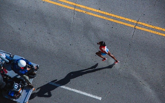 a person running on a road