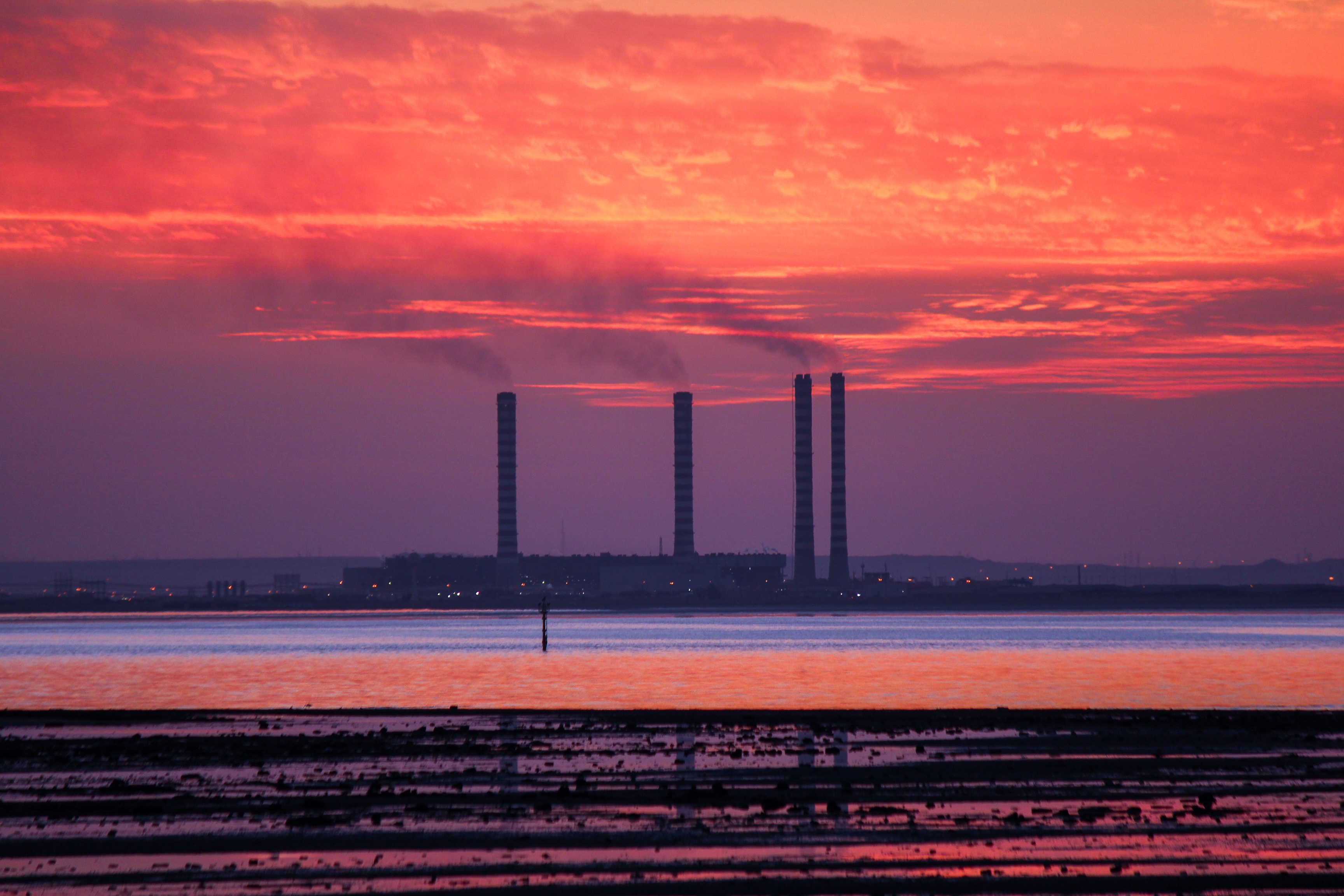 a sunset over a city