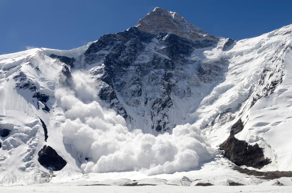 a mountain with clouds