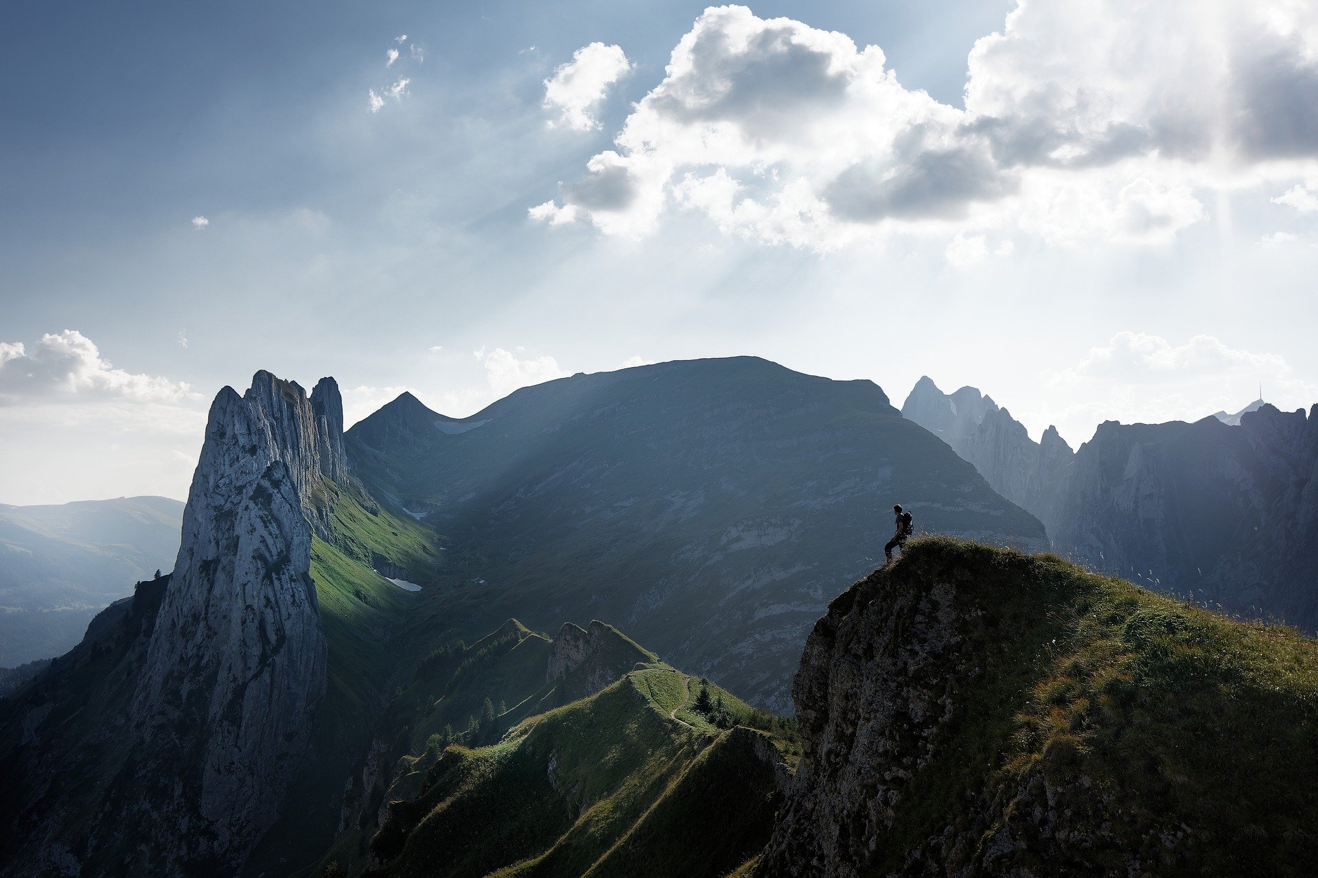 a person standing on a rock