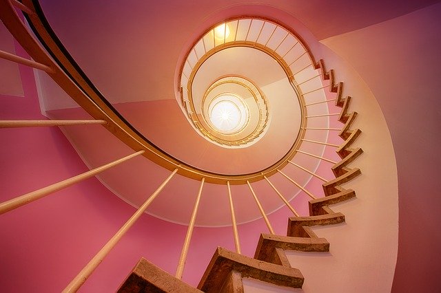 a spiral staircase with a spiral staircase