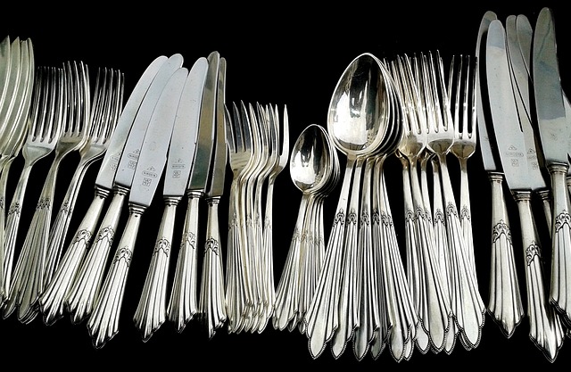 a group of silverware on a table