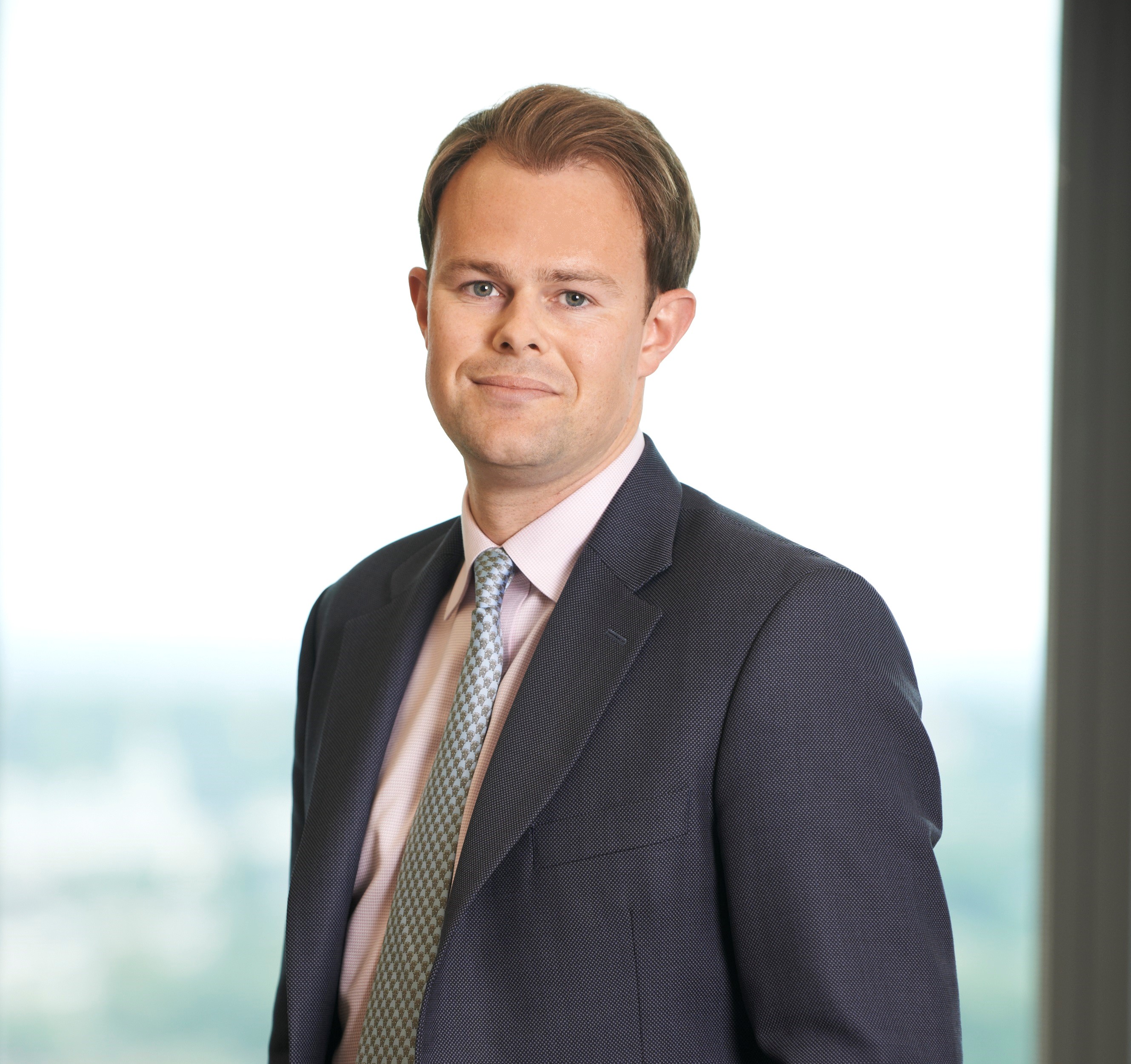 a man wearing a suit and tie