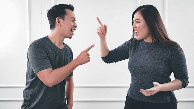 A man and woman arguing