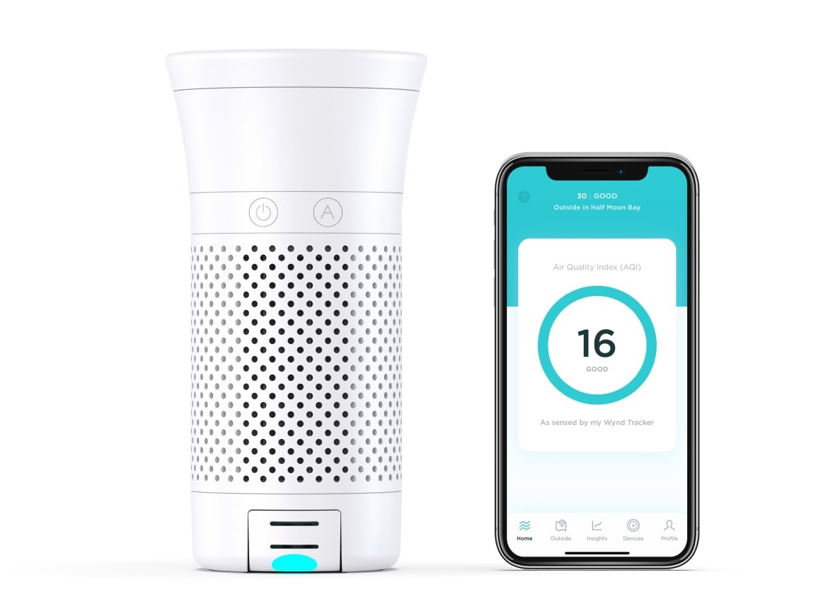 Image of Wynd Portable Air Purifier next to a smartphone showing the Wynd app