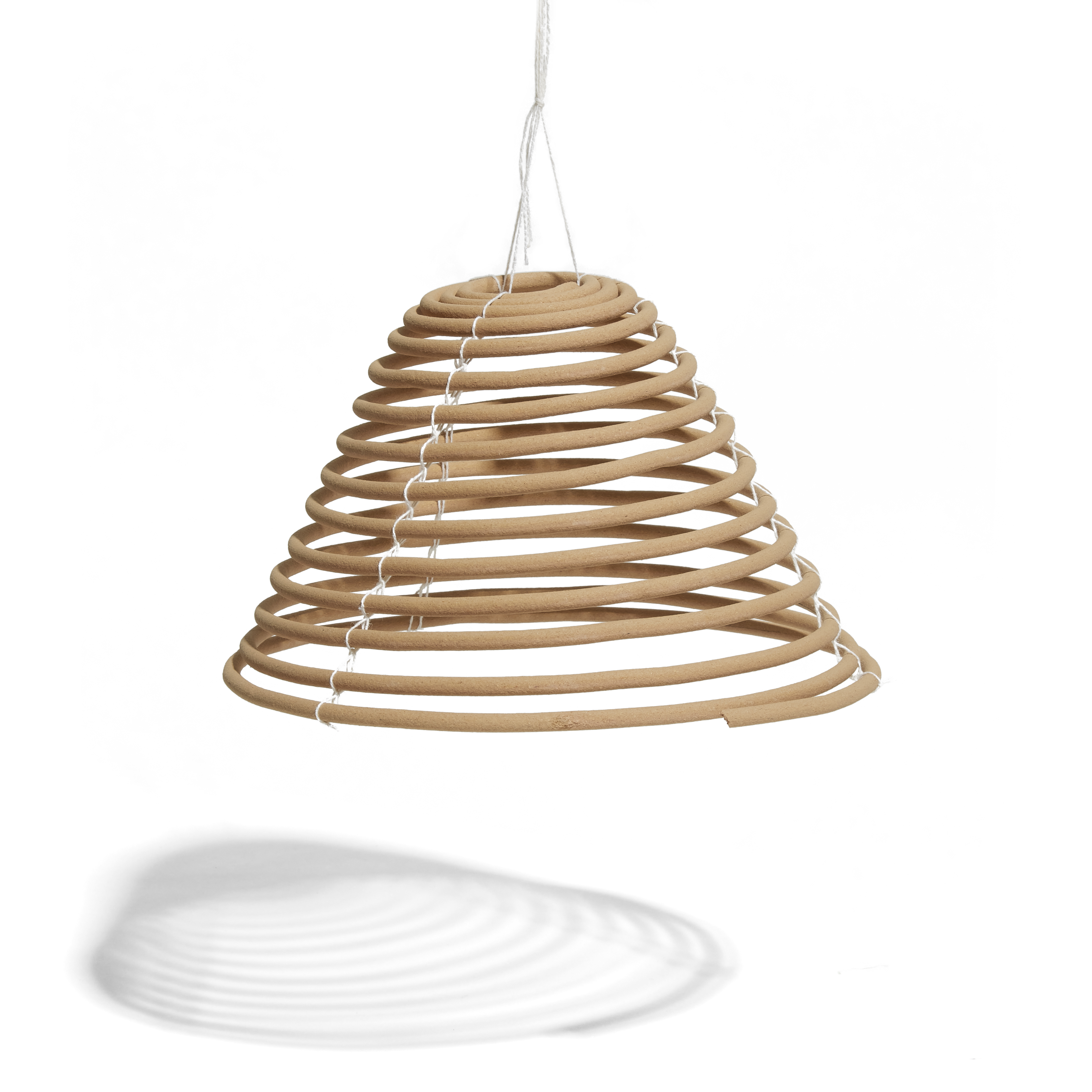 Image of a hanging citronella coil. 