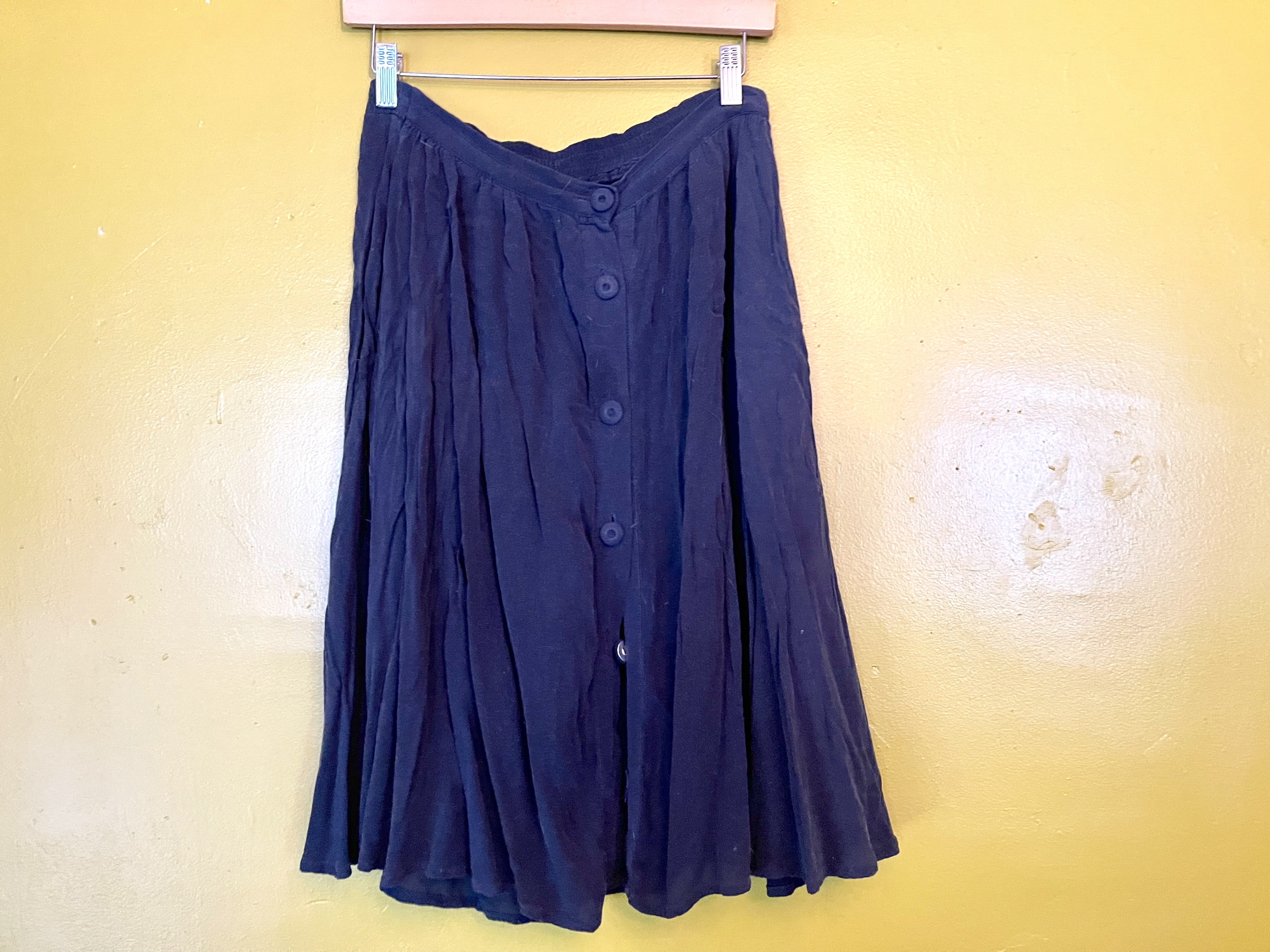 a rayon skirt before Wrinkle Releaser has been used on it.