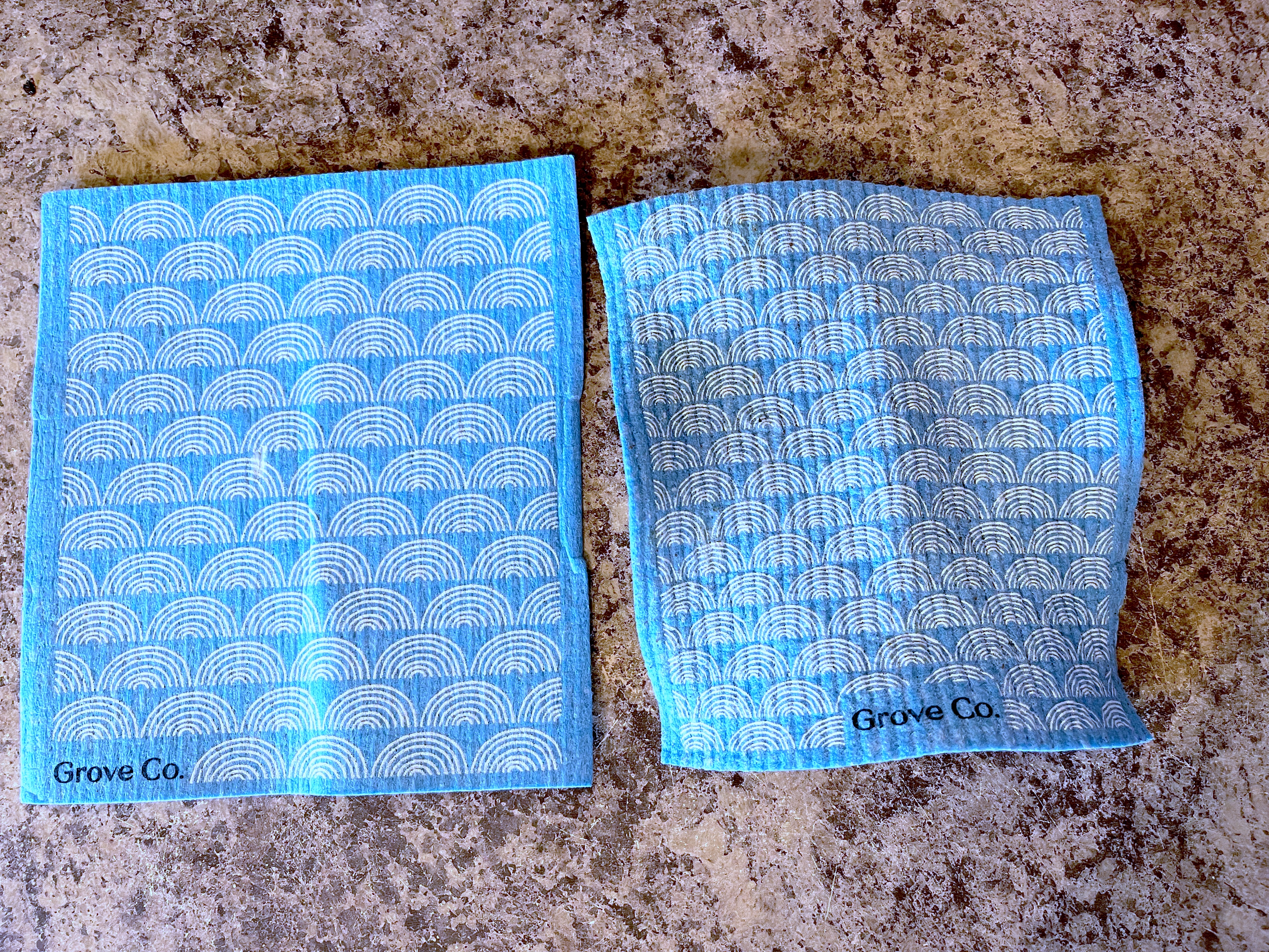 Two European dish cloths on the counter: 1 new, 1 just washed