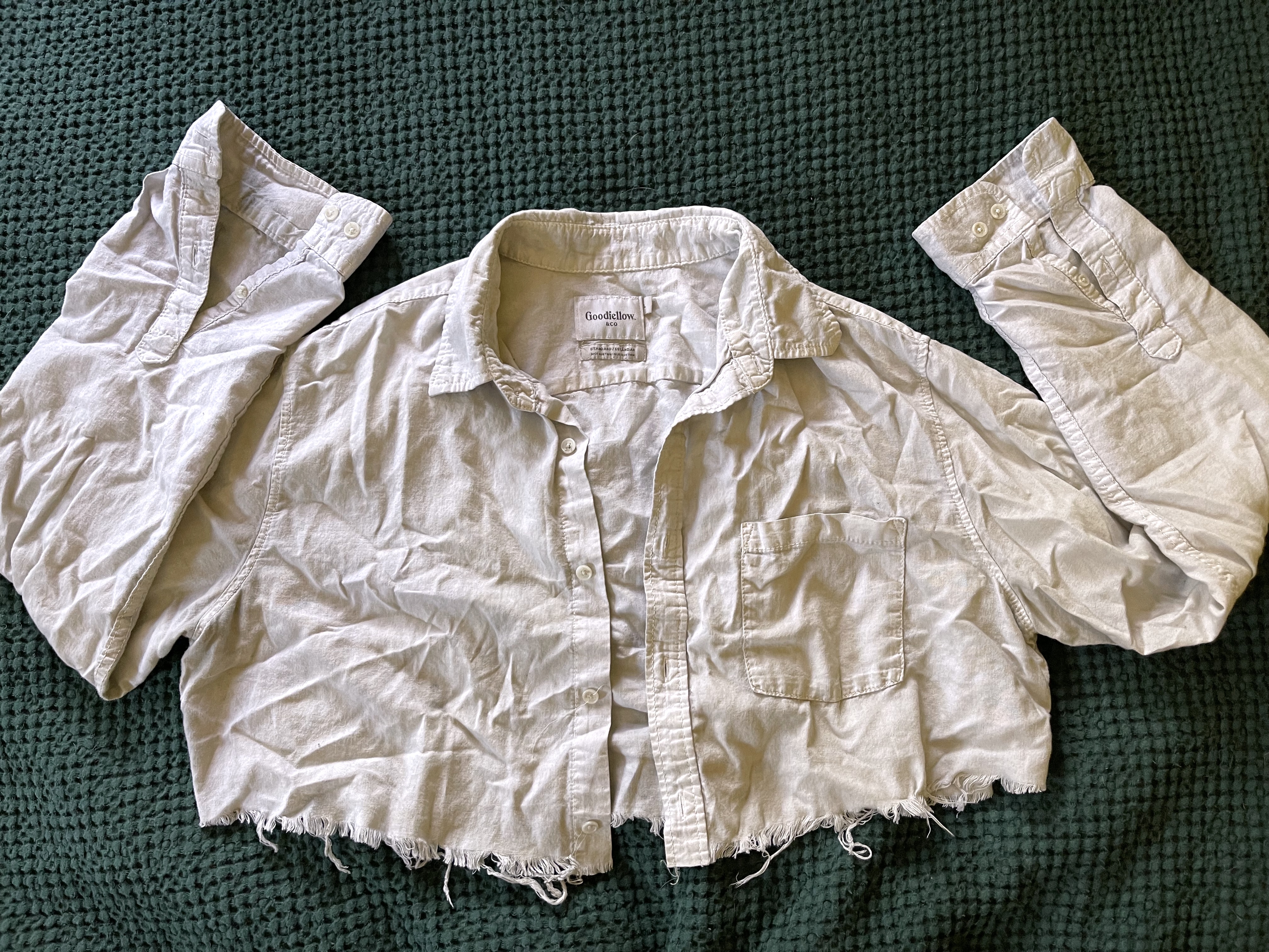 a cotton shirt before being laundry stripped.