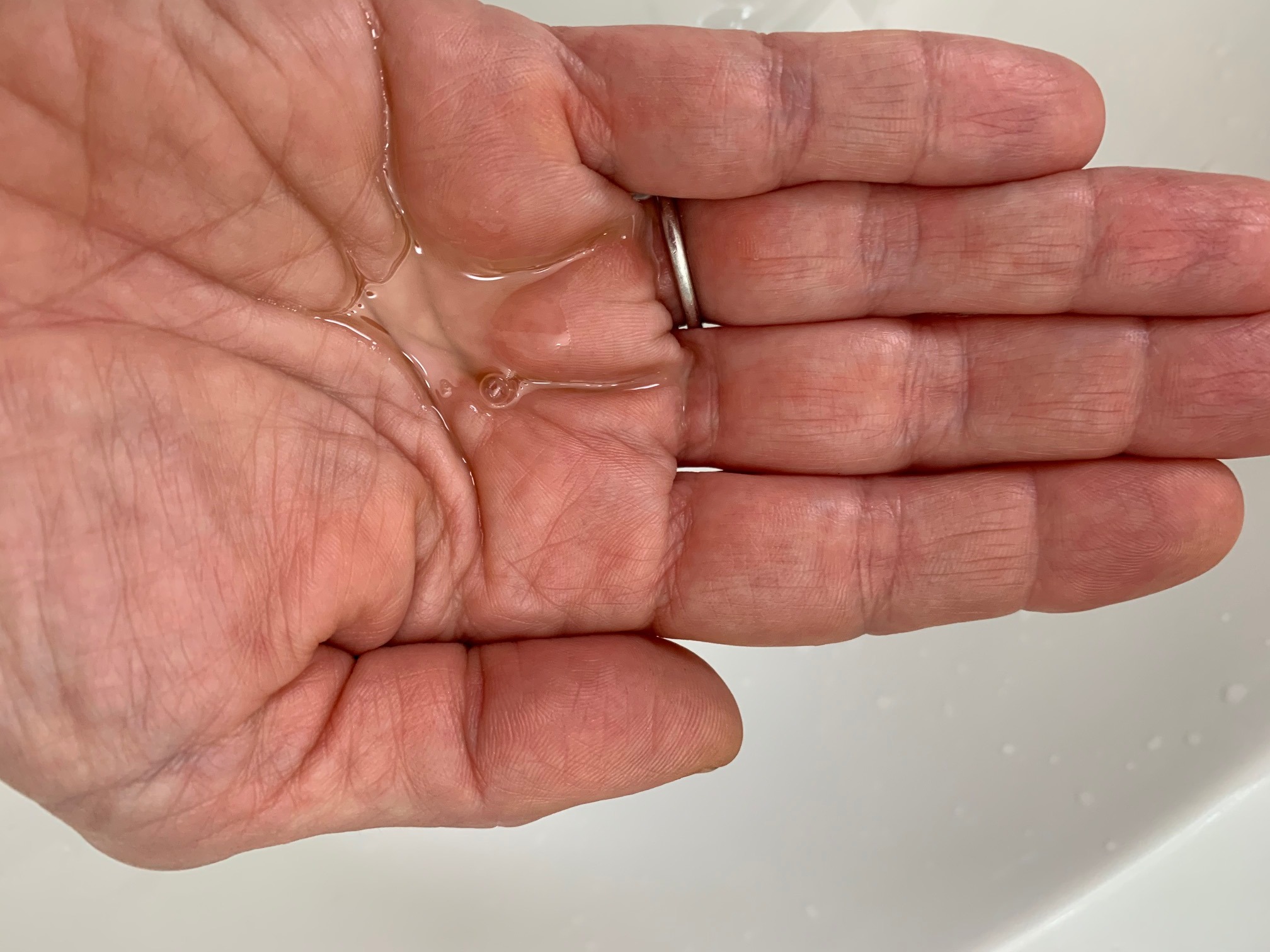 Photo of cleansing oil in hand