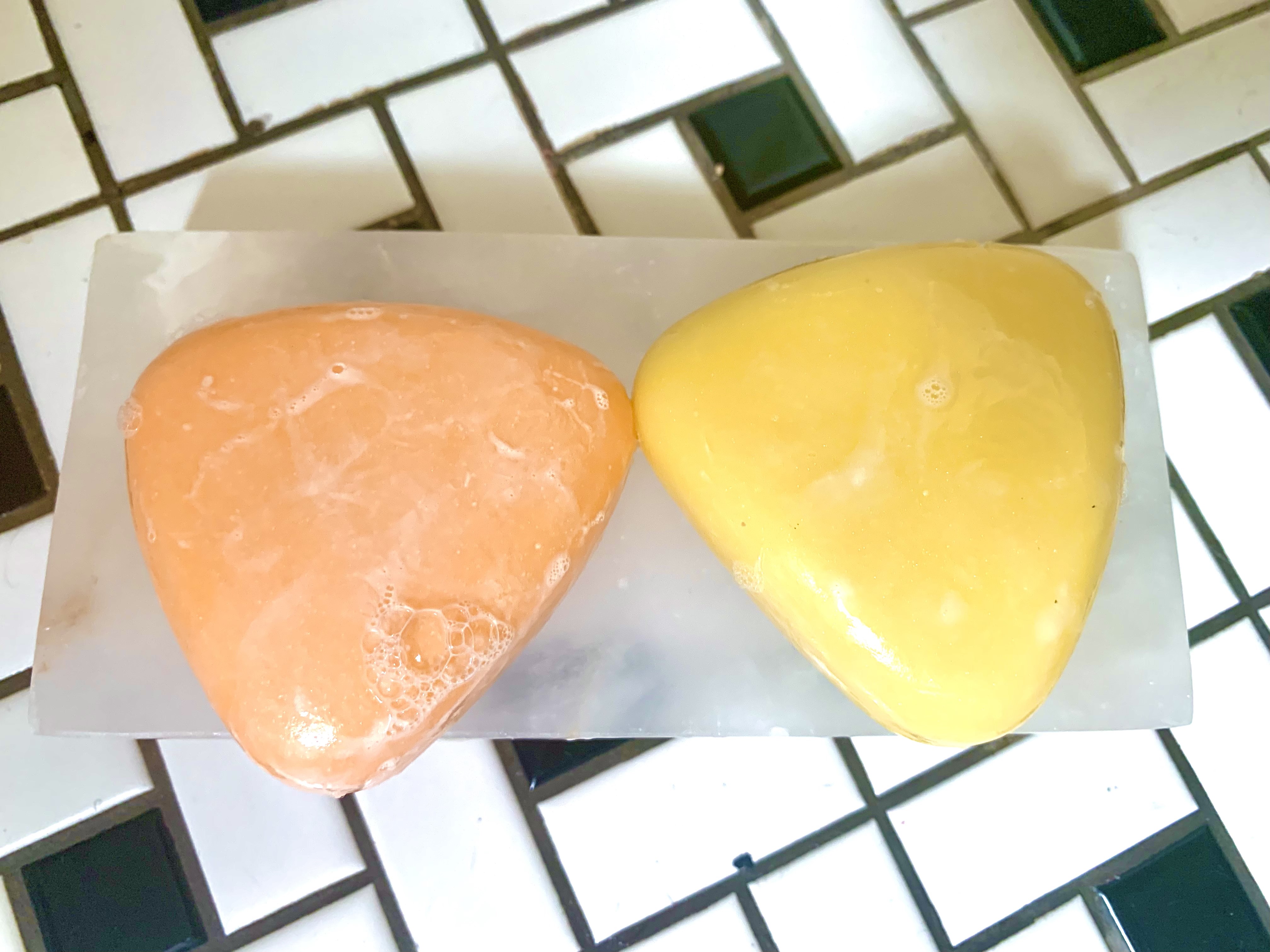 Photo of Peach shampoo bars lathered on soap tray