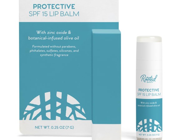 Image of Rooted Beauty Protective Lip Balm packaging and balm