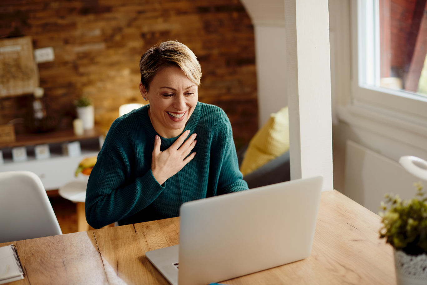 Relieved woman on telehealth video call