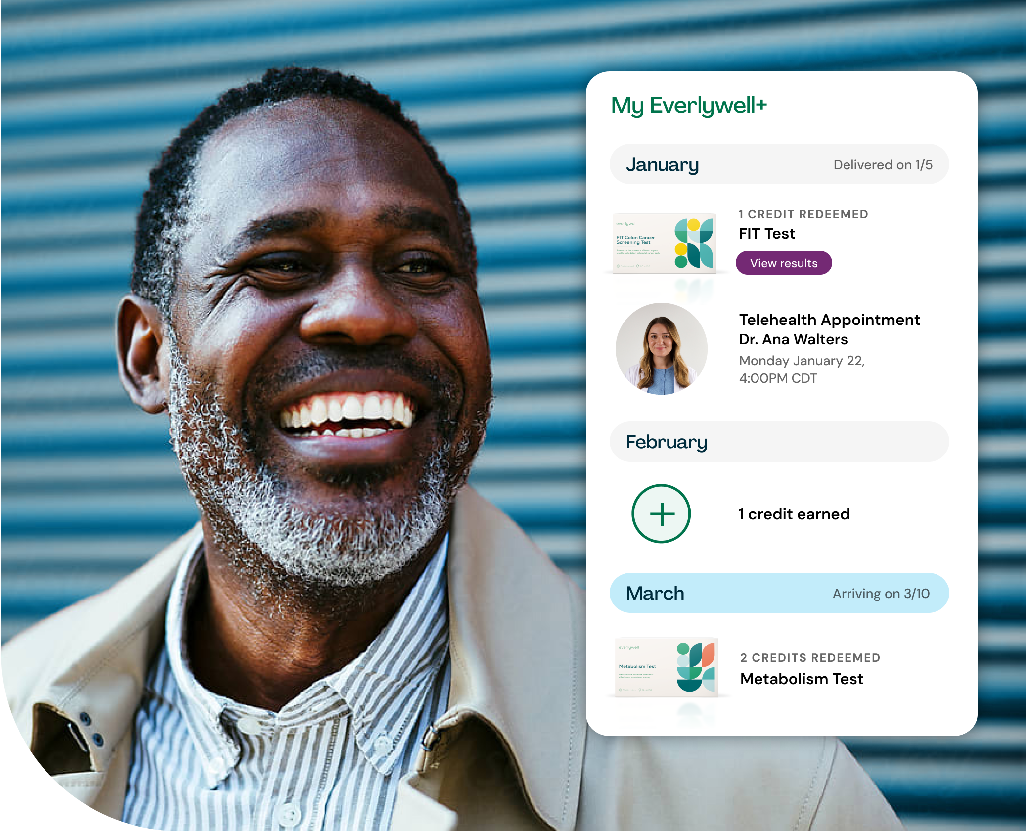 Smiling man looking at Everlywell dashboard with at-home test kits and telehealth appointments
