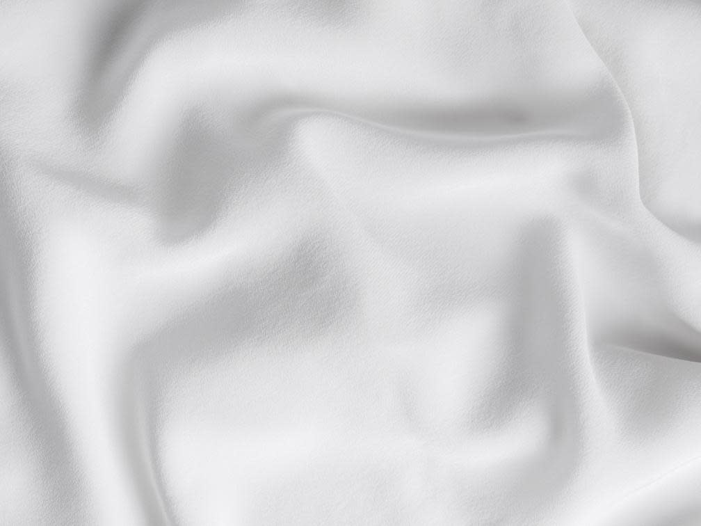 Close Up Of White Silk Pillowcase Set
