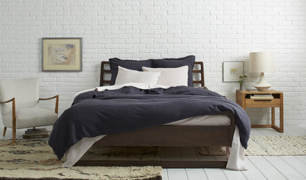 Bed with Coal Linen bedding 