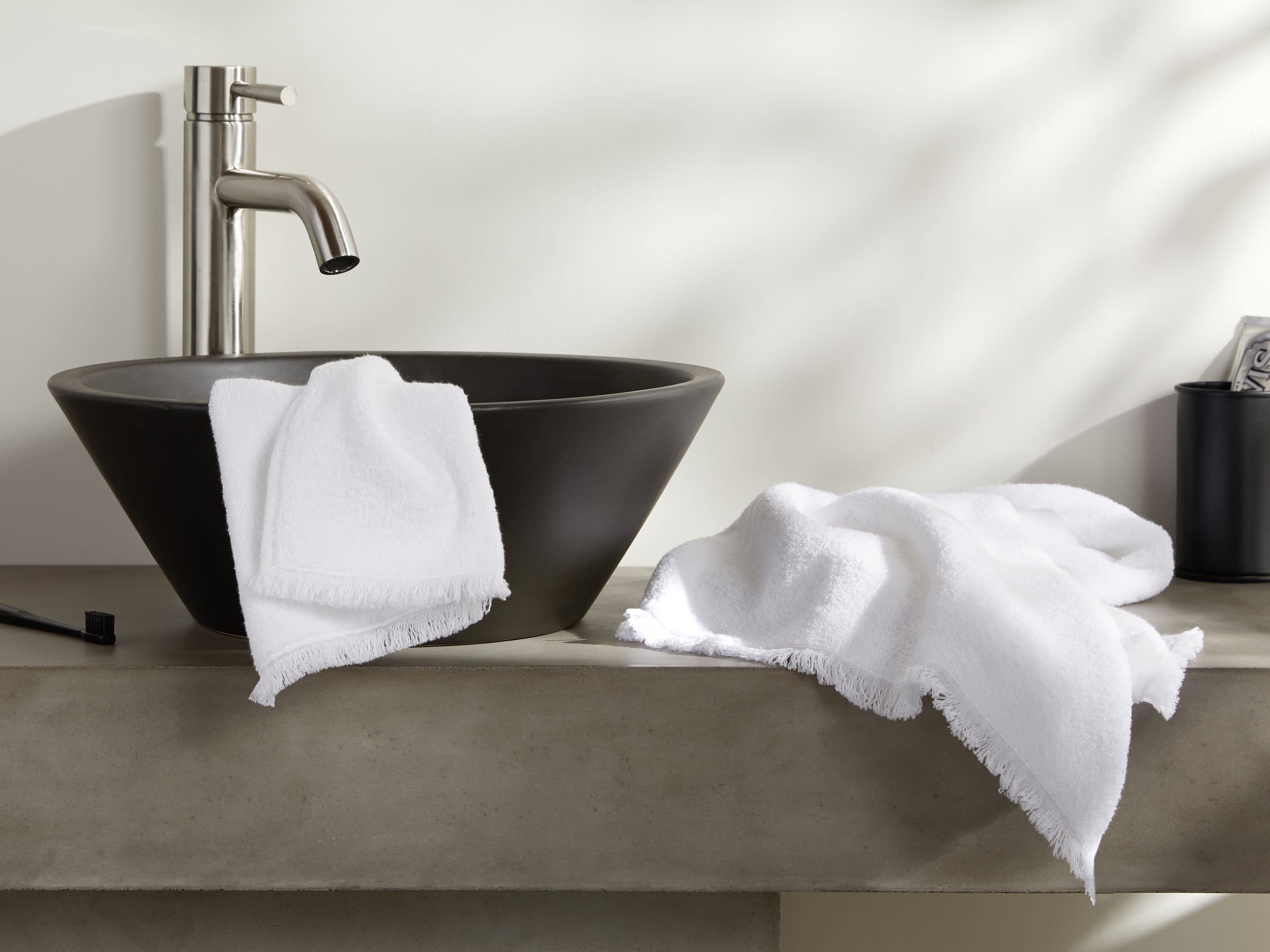 White Spa Towels Shown In A Room