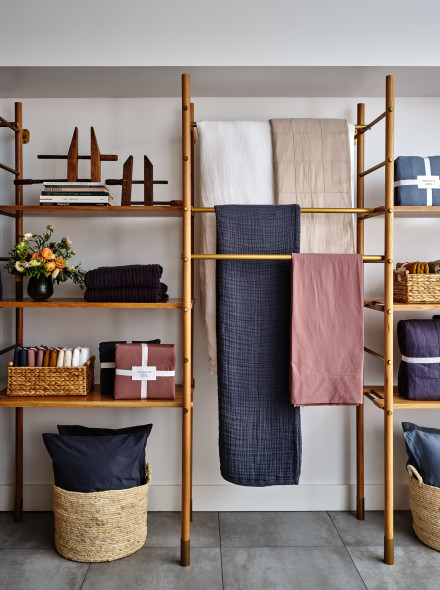 Interior of a Parachute store with various bedding and bath textiles