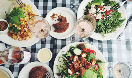 A table with food beverages. 