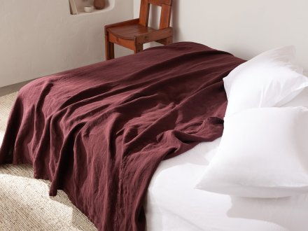 Vintage Linen Bed Cover Shown In A Room