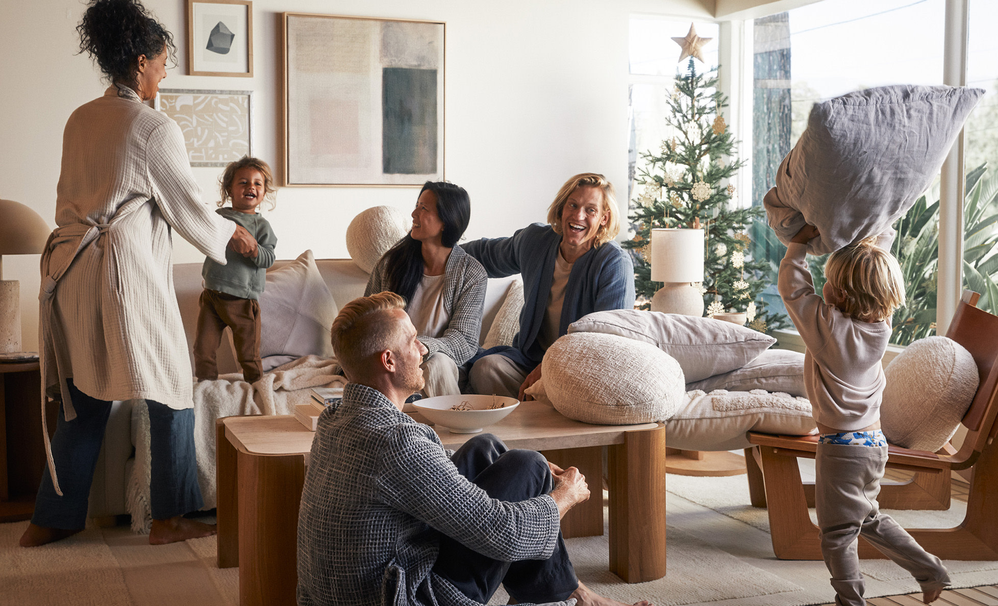 A family gathered in a festive living room