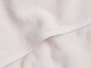 Close Up Of Blush Hooded Baby Towel