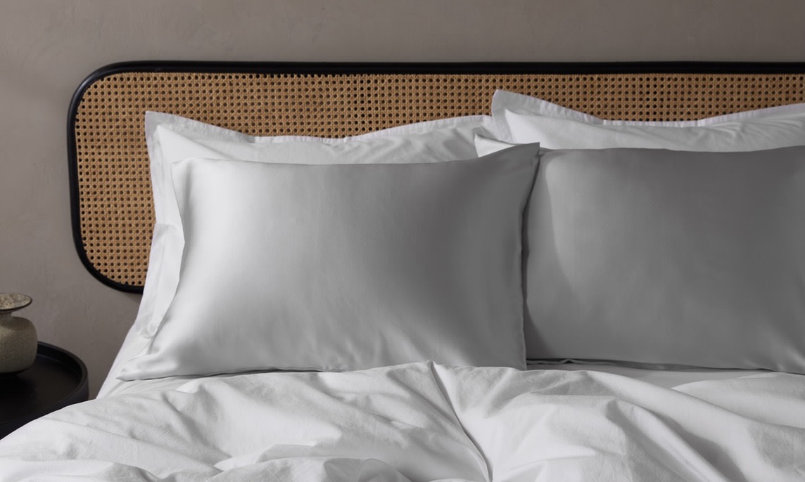 silk pillowcases on a bed 