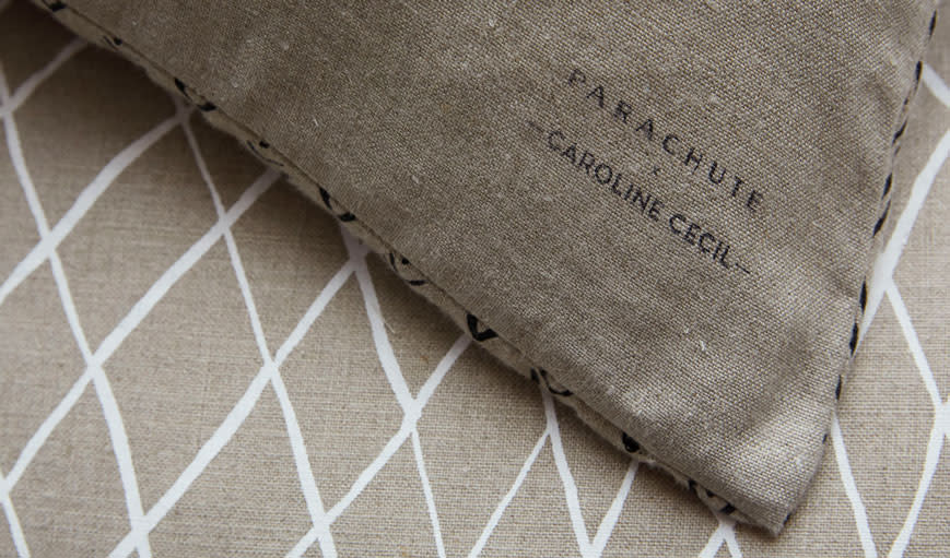 Parachute x Caroline Cecil logo on the corner of a textile 