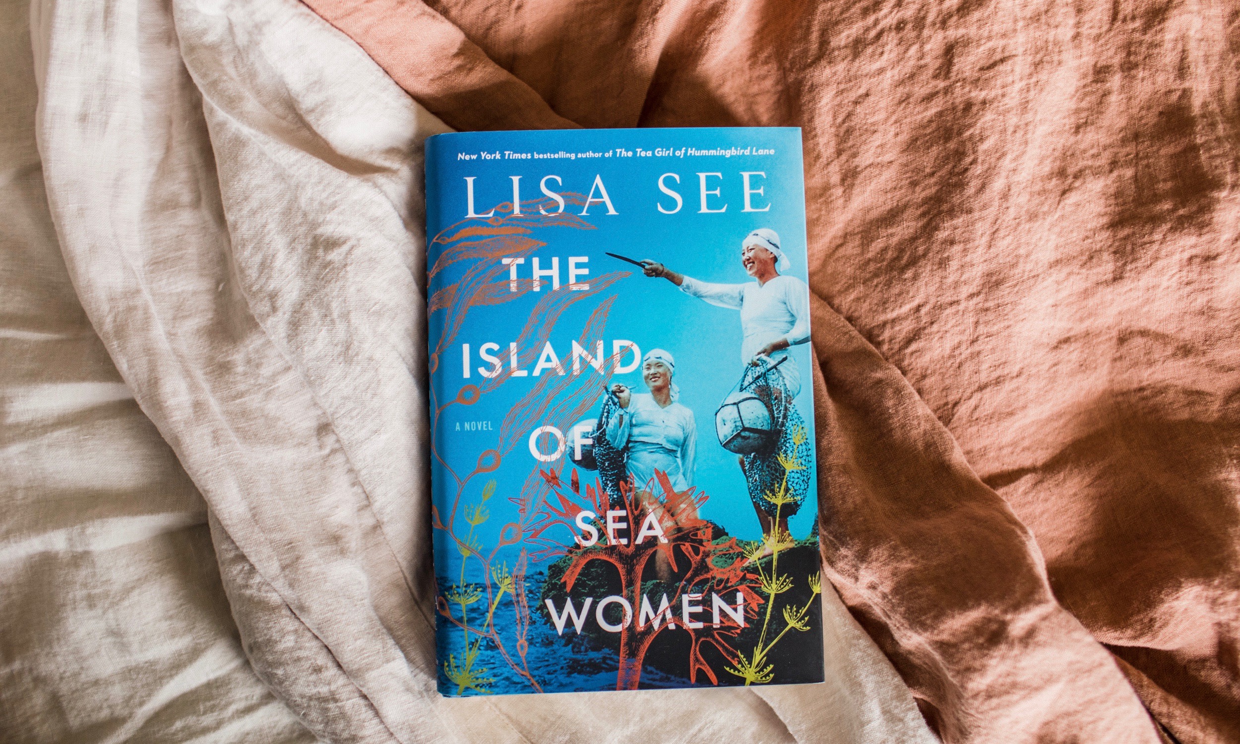 Island of sea women on linen sheets. 