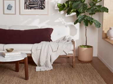 Tobacco Chunky Jute Rug Shown In A Room