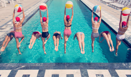 Image of people synchronized swimming. 