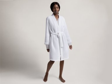 White Waffle Robe Shown In A Room